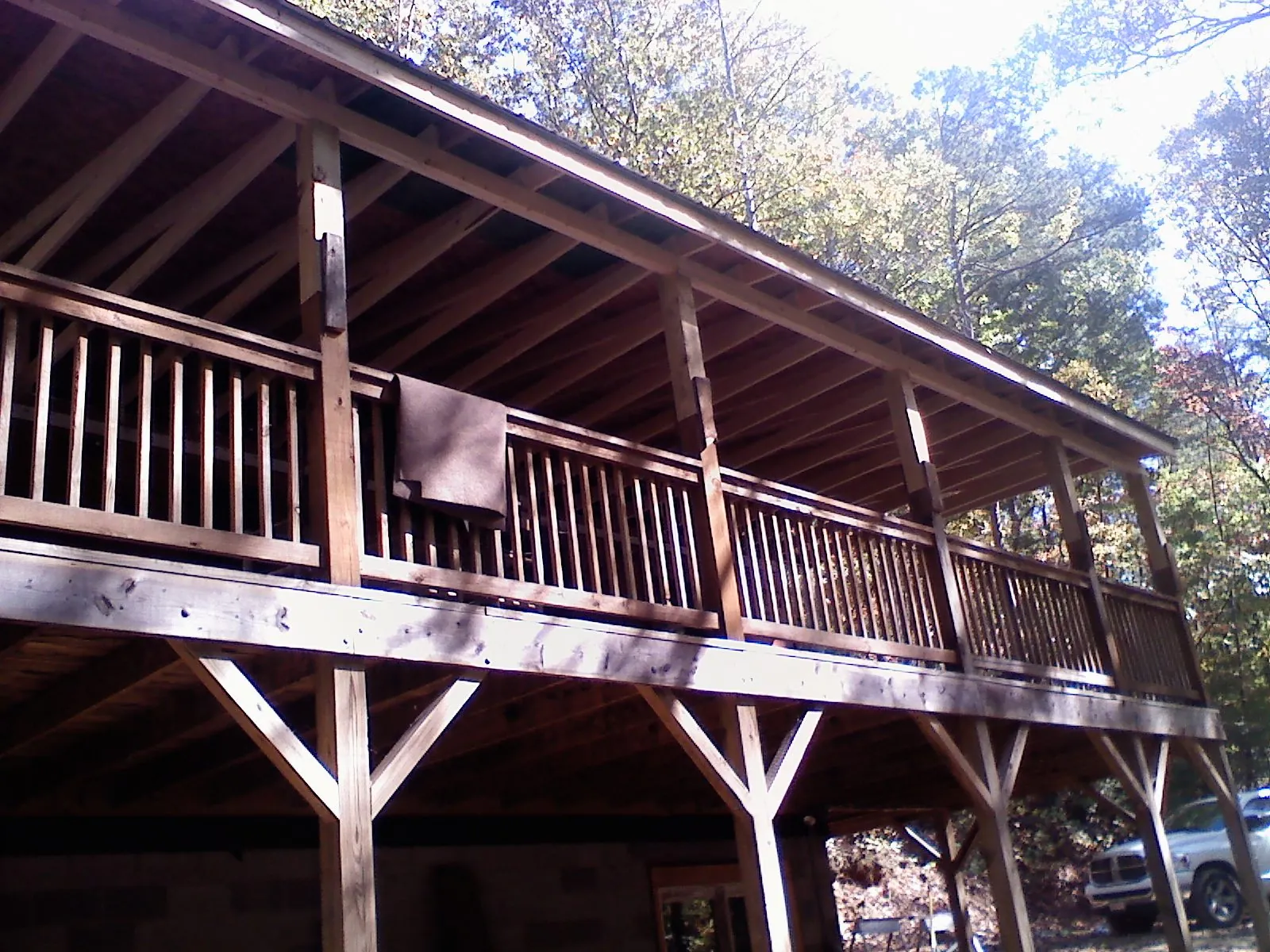 Timber framing under a new elevated porch and deck — Roof Leak Repair in Haines City by Roofing Brothers